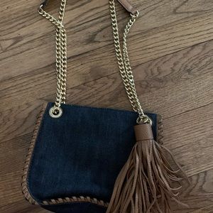 Michael Kors denim purse with gold details/tassel